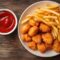 ChIcken Nuggets served with French Fries and